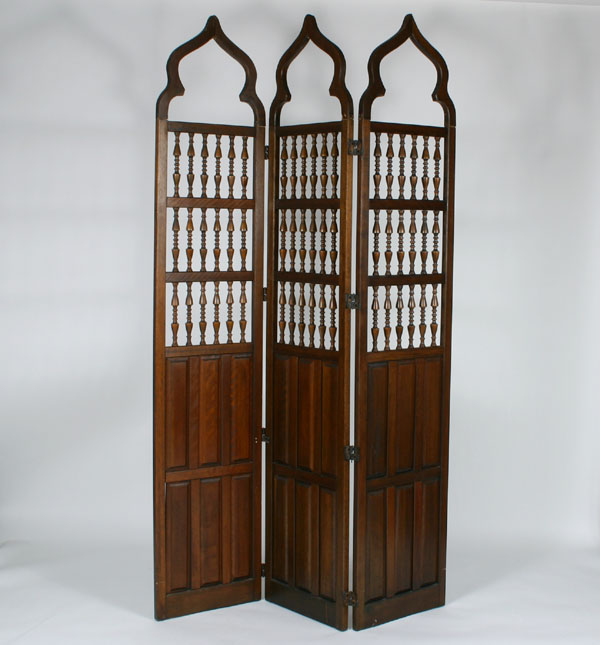 Appraisal: Tall three section screen paneled base turned spindles above dome