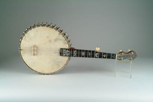 Appraisal: FIVE STRING BANJO Unmarked with metal rim with tighteners mother