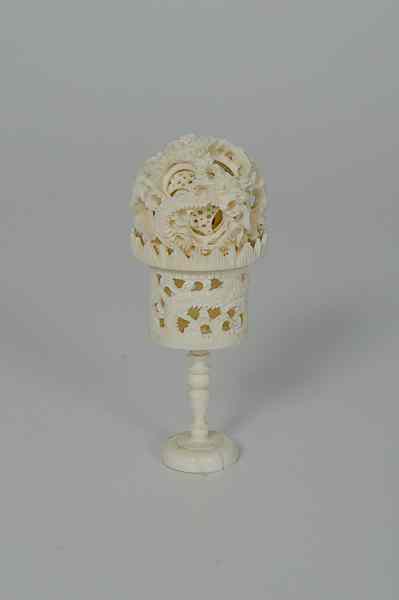 Appraisal: Ivory Puzzle Ball on Stand China A carved ivory puzzle