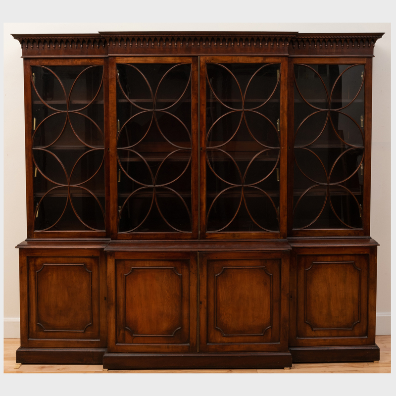 Appraisal: GEORGE III STYLE NEO-GOTHIC GLAZED MAHOGANY BREAKFRONT LIBRARY BOOKCASE ft