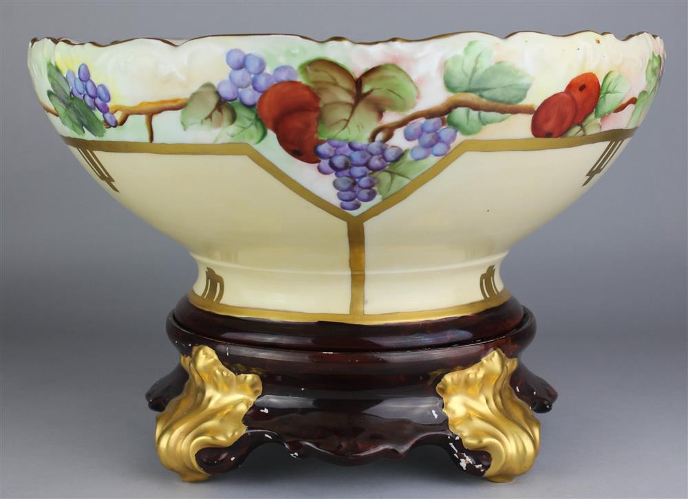 Appraisal: LIMOGES PORCELAIN PUNCH BOWL WITH MATCHING STAND Tressemann Vogt factory