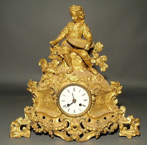 Appraisal: French gilt metal mantel clock th c Lacking works h