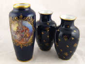 Appraisal: Ceramics A Limoges vase in cobalt blue with hand painted