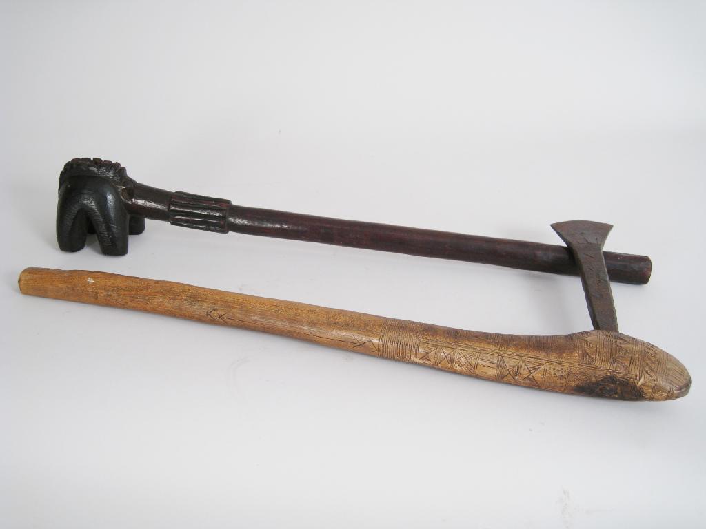 Appraisal: An African carved wooden Shaft the head carved in the