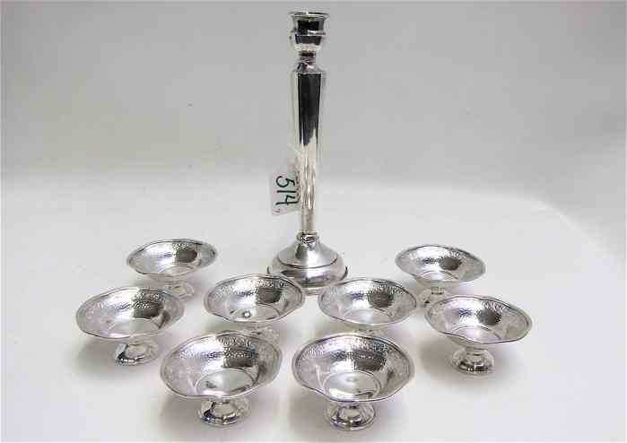 Appraisal: SET OF STERLING SALTS STERLING CANDLESTICK pieces The pedestal salts