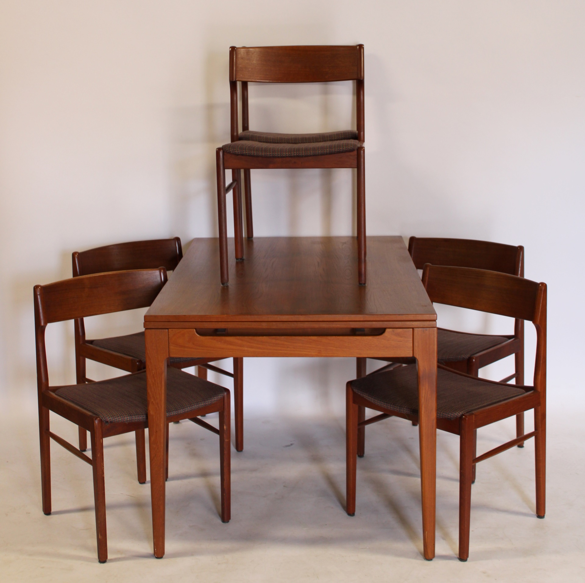 Appraisal: HOVMAND OLSEN DANISH TEAK DINING TABLE CHAIRS Nice original set