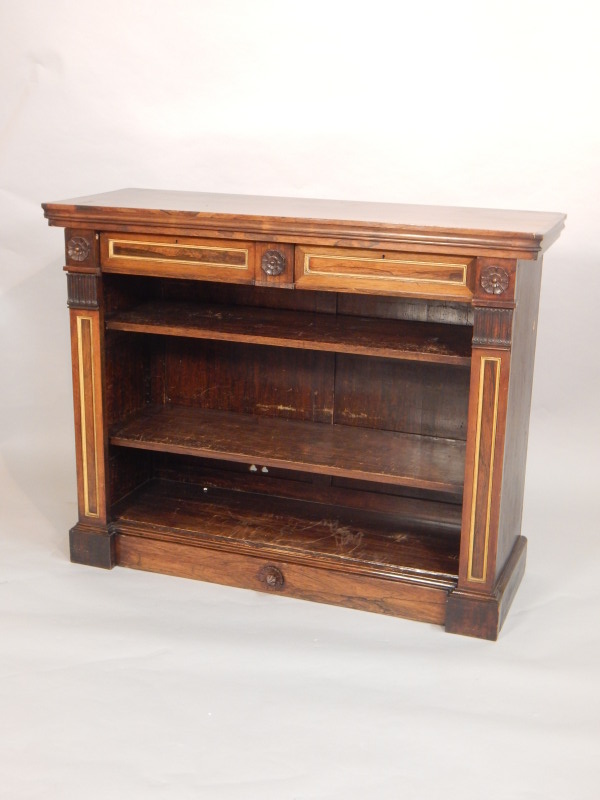 Appraisal: An early Victorian rosewood open bookcase with two frieze drawers