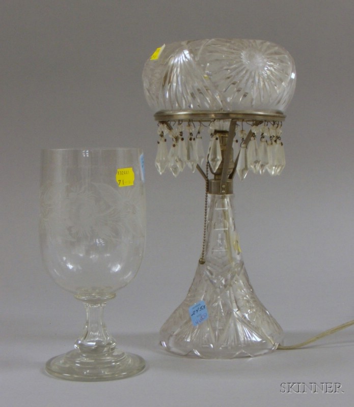 Appraisal: Two Colorless Glass Table Items a cut glass lamp and