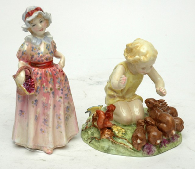 Appraisal: A ROYAL DOULTON AND A ROYAL WORCESTER FIGURE Titled Cerise