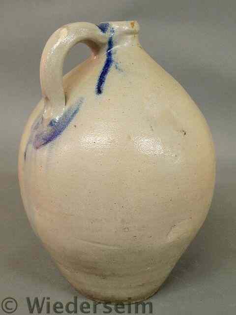 Appraisal: Ovoid stoneware three-gallon jug the handle with blue decoration h