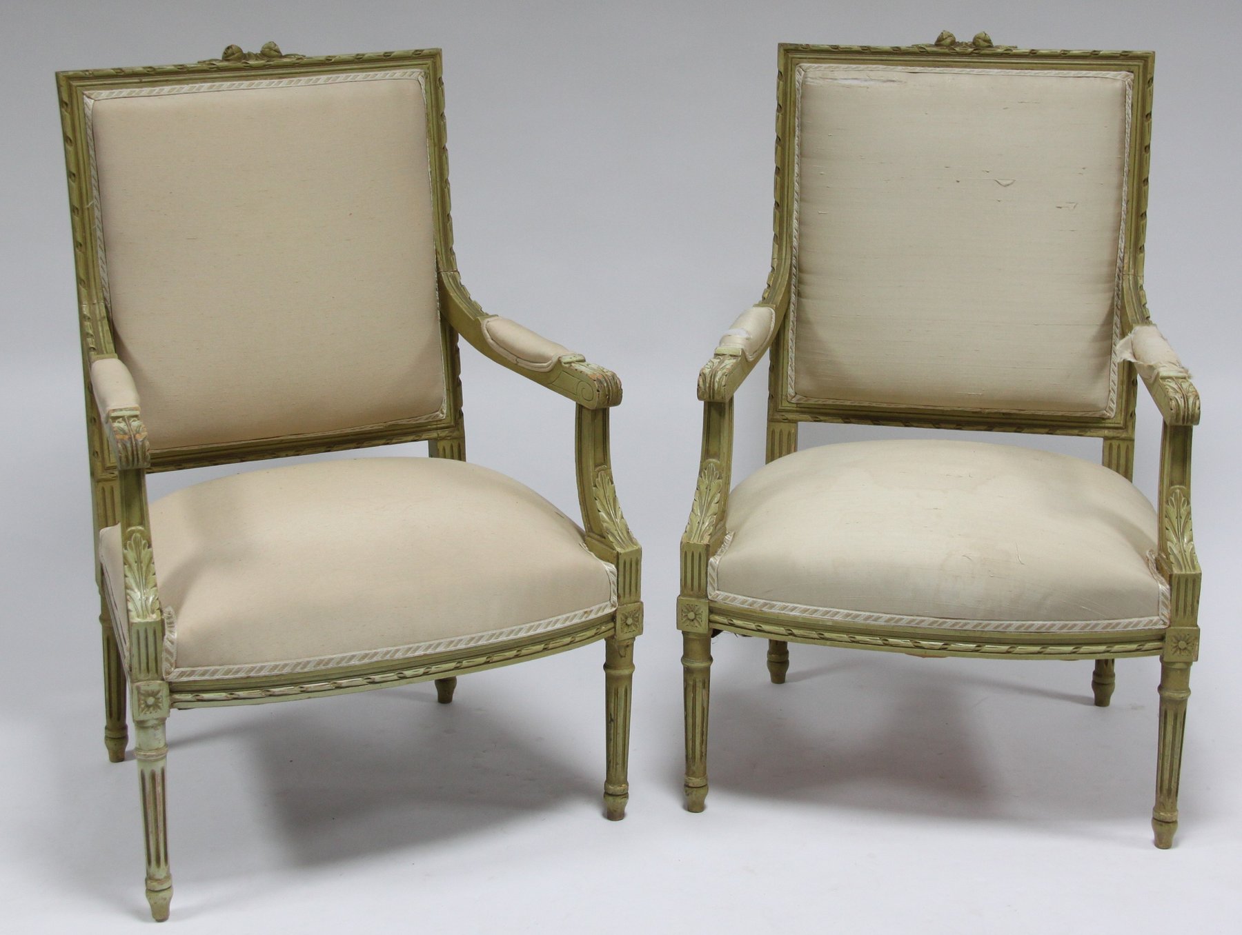 Appraisal: A pair of Louis XVI style fauteuils with carved painted