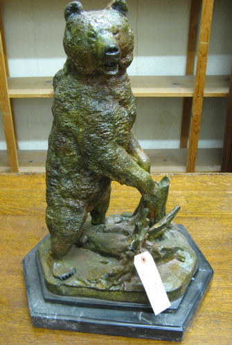 Appraisal: PATINATED BRONZE WILDLIFE SCULPTURE the study of a grizzly bear