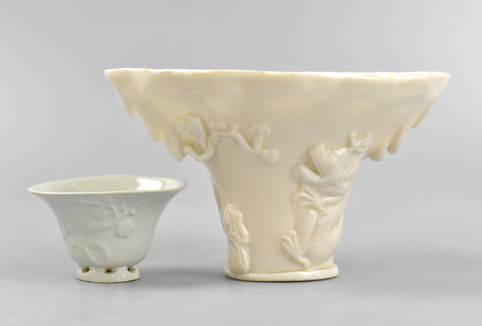 Appraisal: Two Chinese blanc de chine libation cups dating from the