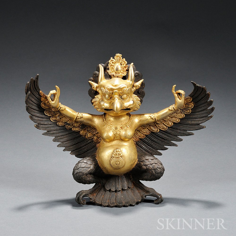 Appraisal: Parcel-gilt Bronze Garuda Sino-Tibetan style half-seated with wings outstretched wd