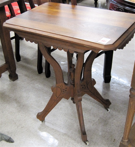 Appraisal: VICTORIAN WALNUT LAMP TABLE Eastlake design American last quarter of