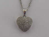 Appraisal: A carat white gold and diamond heart pendant pav set