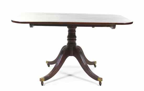 Appraisal: A Regency Mahogany Tilt-Top Breakfast Table having a rectangular top