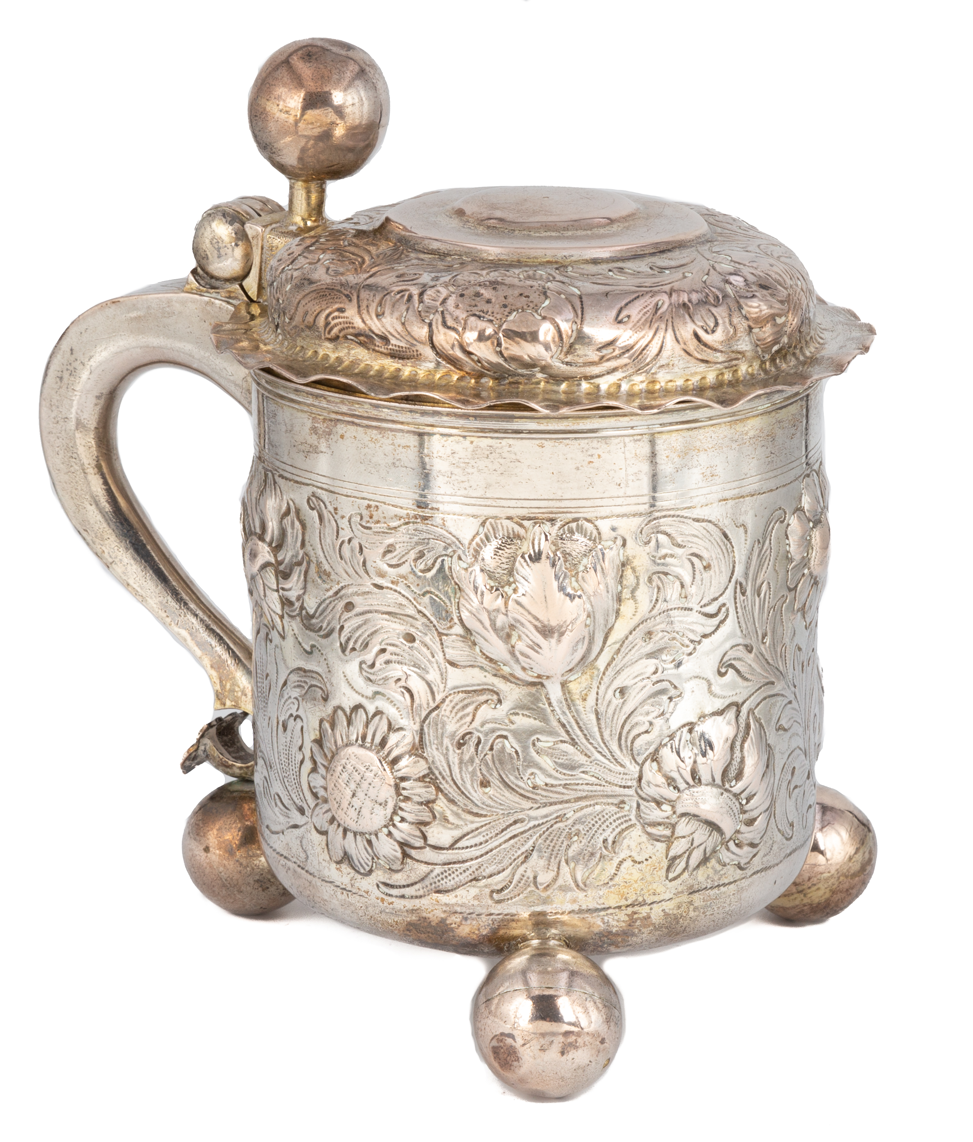 Appraisal: LEIPZIG PARCEL GILT SILVER TANKARD repousse with floral motif Decorated