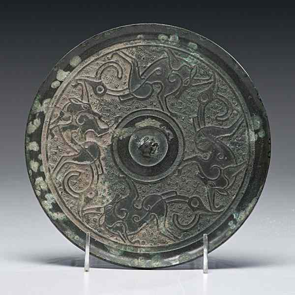 Appraisal: Chinese Bronze Mirror with Dragons Chinese a bronze mirror the