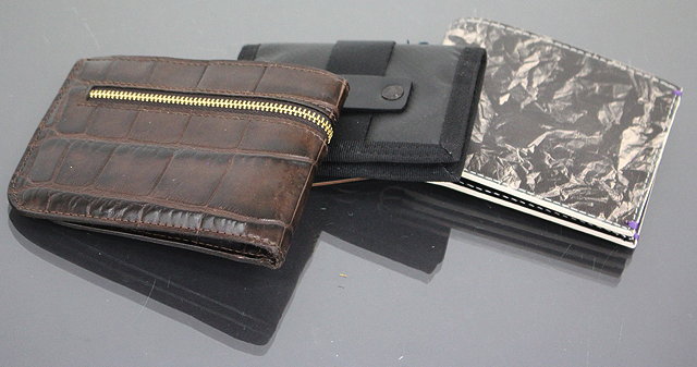 Appraisal: TWO WALLETS by Paul Smith with original boxes together with