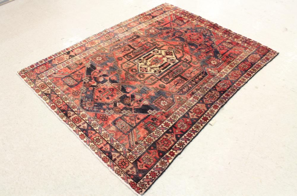 Appraisal: SEMI-ANTIQUE PERSIAN TRIBAL AREA RUG geometric curvilinear and stylized floral