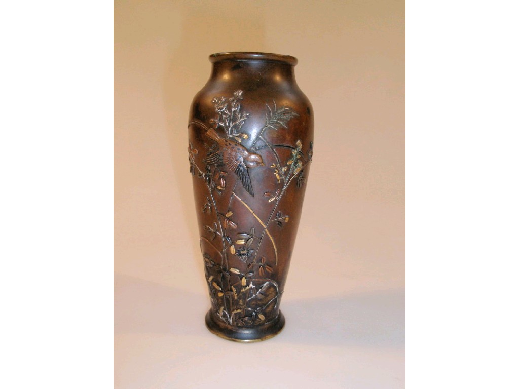 Appraisal: A Japanese Meiji period shibayama bronze ovoid vase decorated in