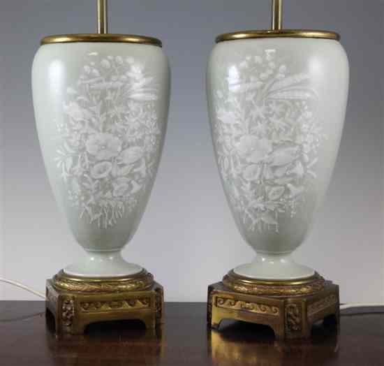 Appraisal: A pair of Continental pate-sur-pate porcelain ovoid vases decorated with