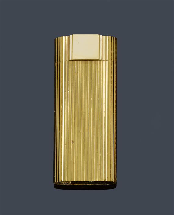 Appraisal: LIGHTER CARTIER Gold-plated Cylindrical gas lighter with oval base and