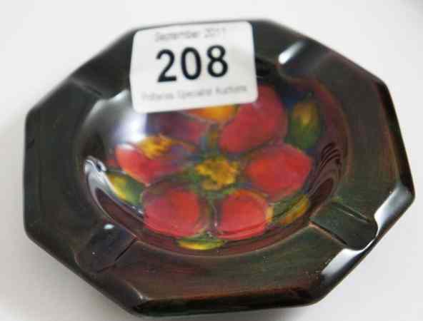 Appraisal: Moorcroft Flambe Ashtray decorated with Clematis