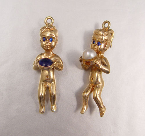 Appraisal: K BOY GIRL FIGURAL CHARMS K yellow gold boy and