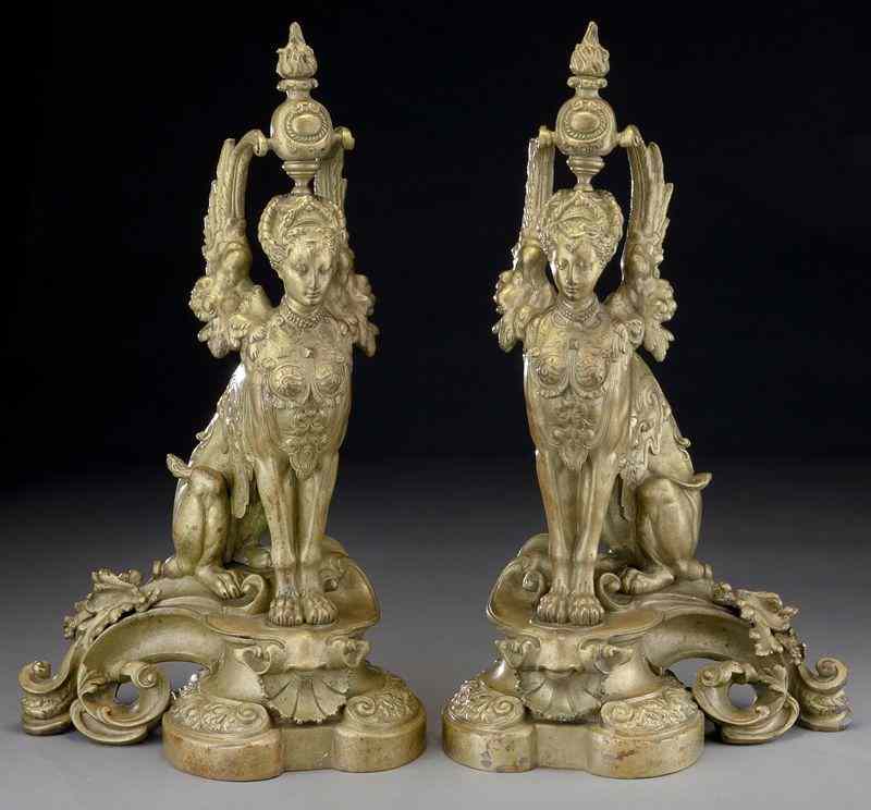 Appraisal: Pr Egyptian Revival gilt chenets modeled assphinxes the winged figures