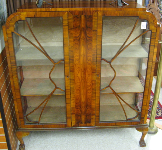 Appraisal: WALNUT CHINA DISPLAY CABINET English early th century Art Deco