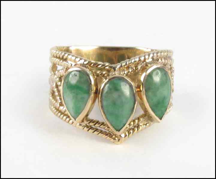 Appraisal: JADE AND KARAT YELLOW GOLD RING grams Condition No Specific