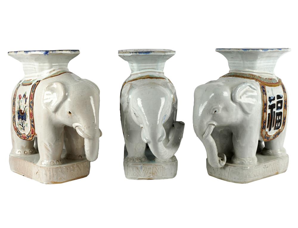 Appraisal: THREE GLAZED CERAMIC GARDEN SEATSeach modeled as an elephant Provenance