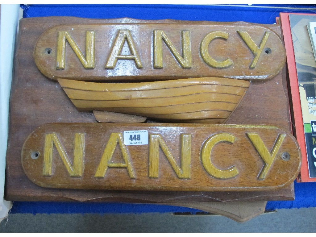 Appraisal: Lot comprising two boat nameplates 'Nancy' a half hull mount