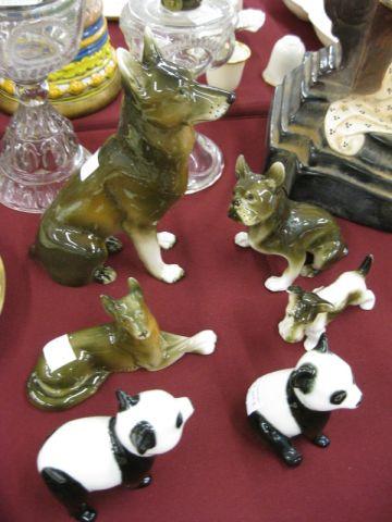 Appraisal: Royal Dux Porcelain Animal Figurines panda bear and various dogs