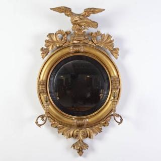 Appraisal: Regency giltwood convex girandole mirror th c possibly American eagle