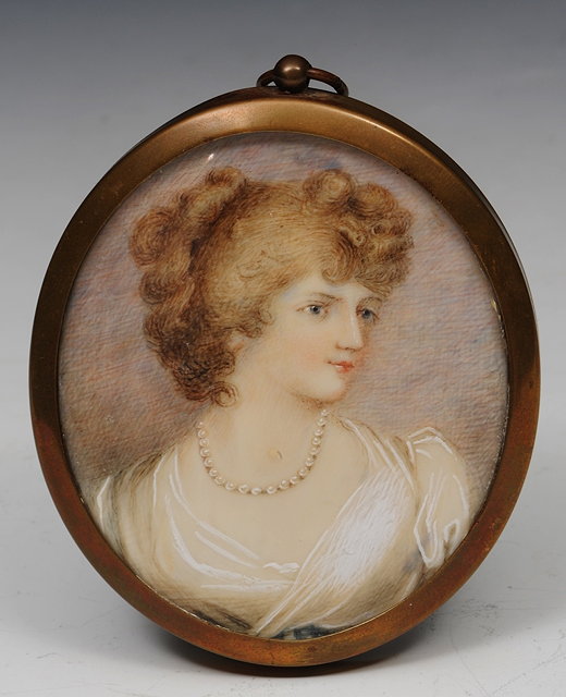 Appraisal: th Century English SchoolOval portrait miniature of a young girl