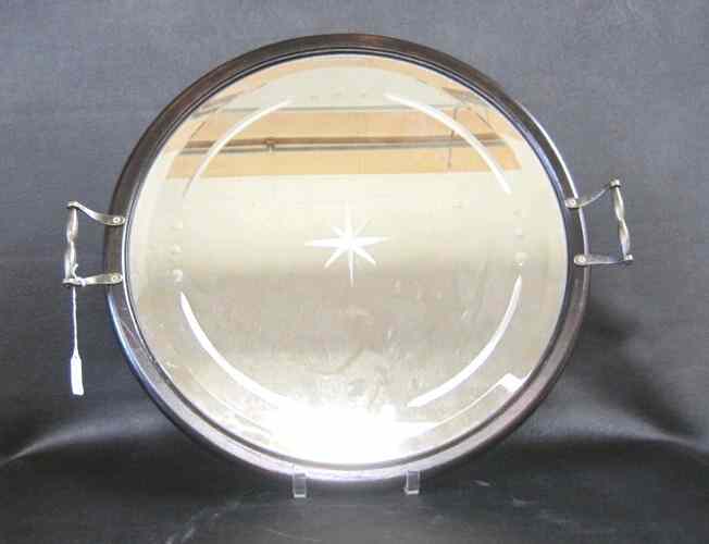 Appraisal: A VICTORIAN ENGRAVED ROUND SERVING TRAY combination beveled plateau mirror