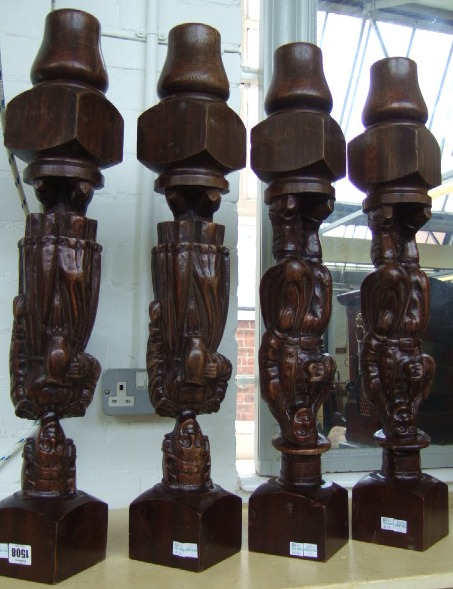 Appraisal: A set of four hardwood table legs the columns carved