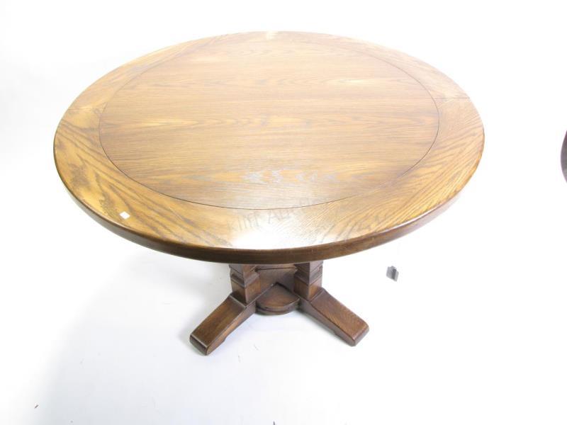 Appraisal: A Romweber Viking Oak extension table Pattern R diameter closed