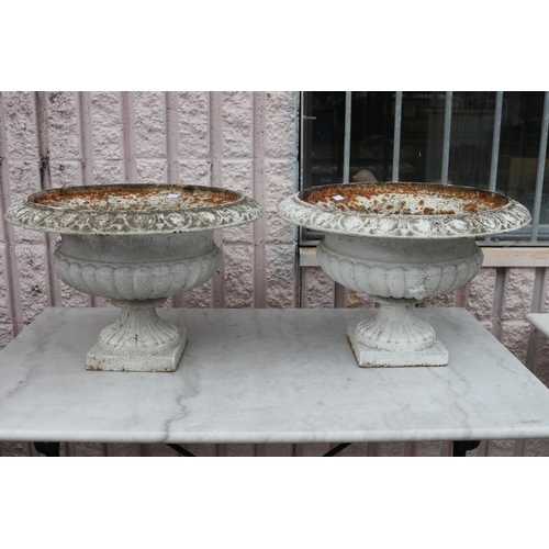 Appraisal: Pair of antique French cast iron garden urns egg and