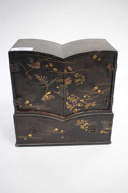 Appraisal: A TH CENTURY JAPANESE LACQUERED TABLE CABINET with Maki-e two