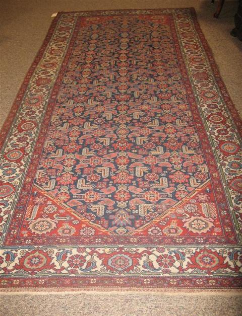 Appraisal: ORIENTAL NAVY AND RED GROUND RUNNER X Provenance A Virginia