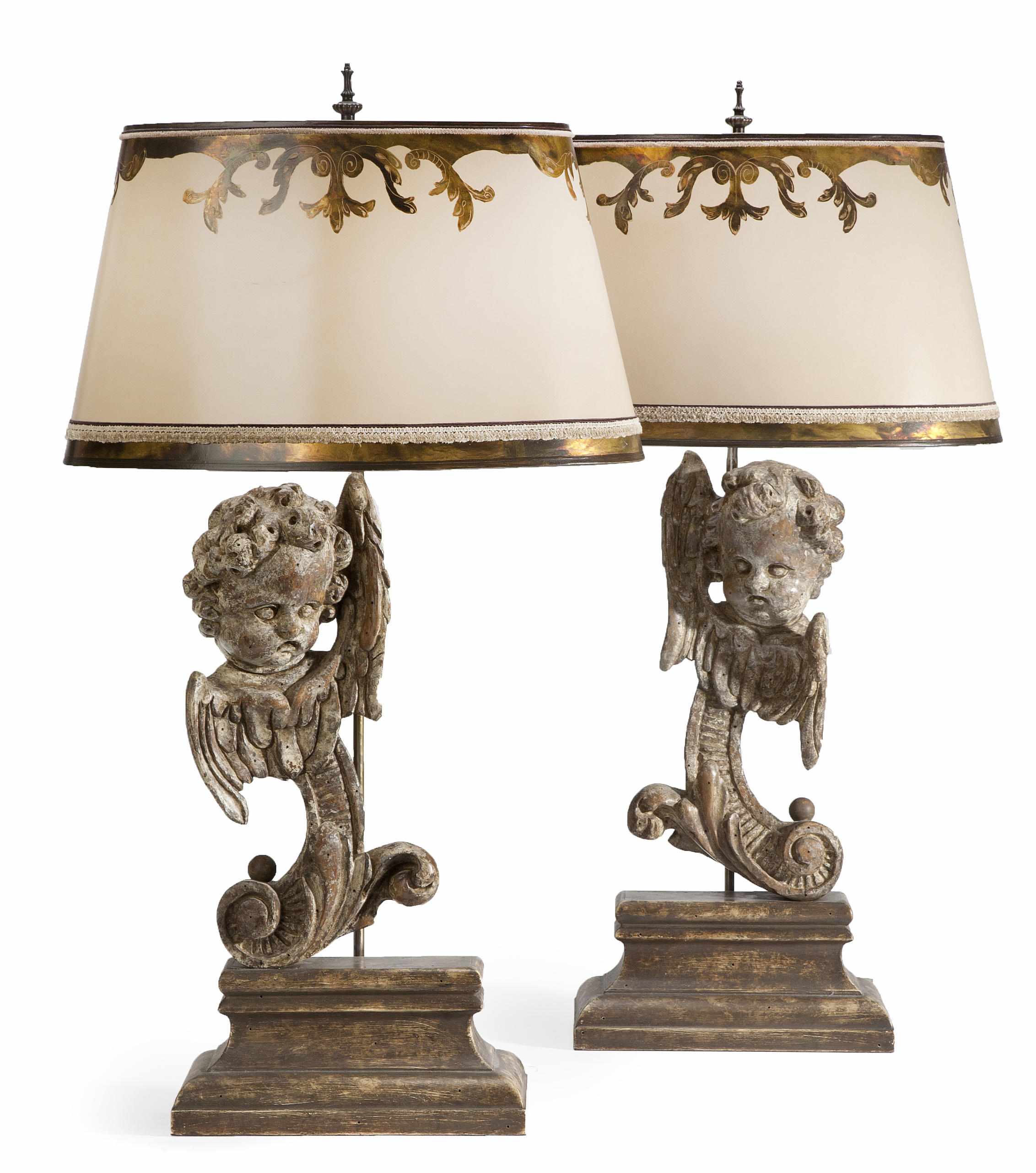 Appraisal: A pair of Italian Baroque style carved silver gilt table