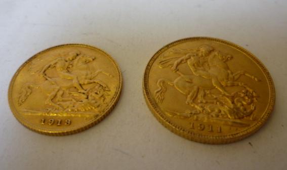 Appraisal: A GEORGE V GOLD SOVEREIGN and a half sovereign