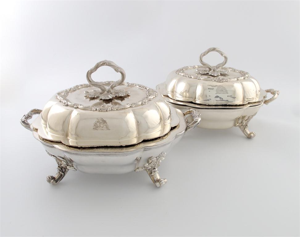 Appraisal: A pair of old Sheffield plated entree dish covers with