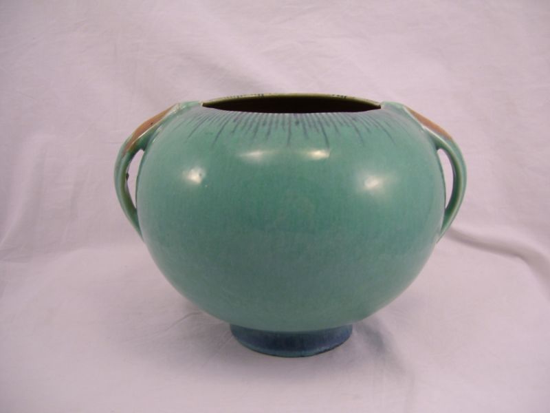 Appraisal: Roseville Orian Ball shaped vase with a turquoise gloss glaze