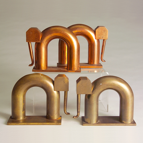 Appraisal: WALTER VON NESSEN CHASE Two pairs of Jumbo bookends one