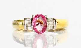 Appraisal: A two-tone ct gold pink sapphire and eight diamond ring